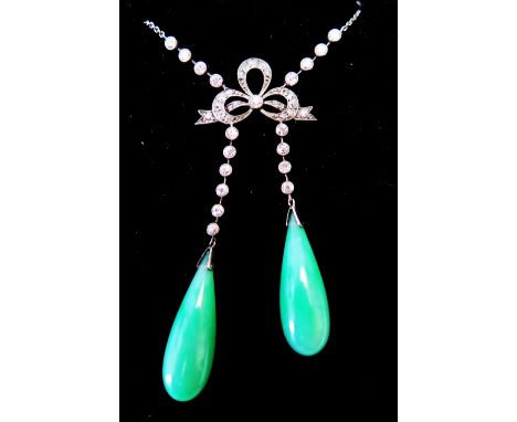 A Fine Jade and Diamond Necklace in a white metal setting, probably platinum 