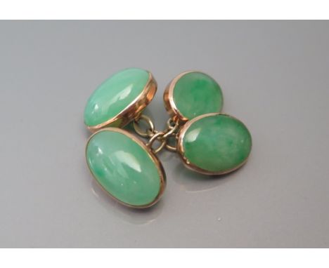 A Pair of Jade Cabouchon Cut Cufflinks 