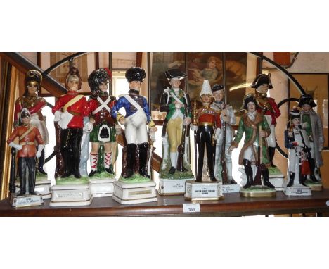 Shelf of Military and Napoleonic soldier china figures 