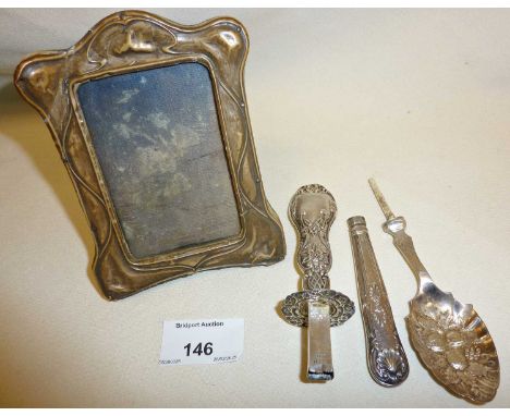 Art Nouveau silver photo frame with easel back, hallmarked for Birmingham 1910, maker BPDC. Approx. 12.5cm high. Together wit