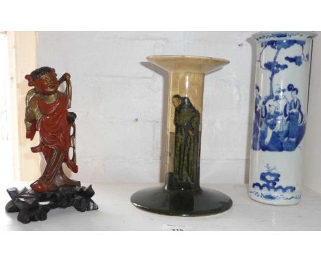 Royal Doulton Art Nouveau series ware candlestick, carved lacquer Chinese figure and a Chinese blue and white cylinder vase (