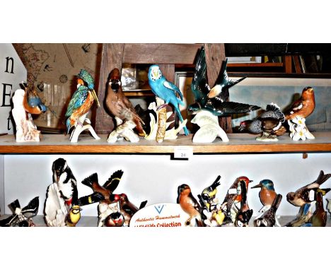 Large collection of Goebel Hummel porcelain birds from the Wildlife Collection (25 + shop sign)