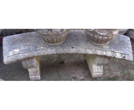 Curved stonework garden bench