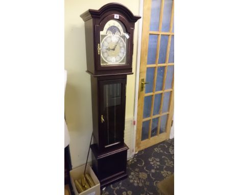 A modern mahogany effect cased Grandmother clock with polished brass and silvered dial with constellation chain driven moveme