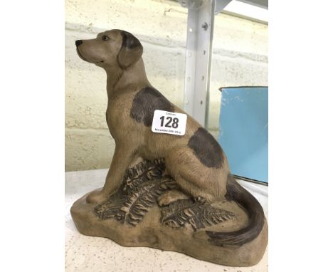 A Poole Pottery Barbara Linley Adams stoneware model of a Seated Hound (8 inches).