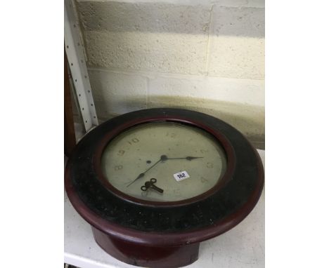 A late 19th century circular American advertising wall clock by the Baird Clock Company, U.S.A. (later painted).