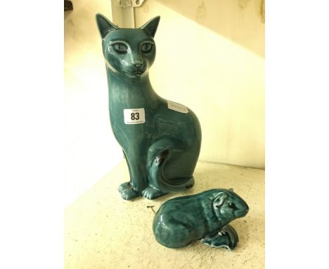A large Poole Pottery blue glazed Vogue Cat together with a blue glazed model of a Guinea Pig.