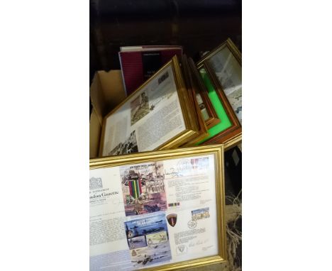 A box of framed and glazed signed First Day Covers.