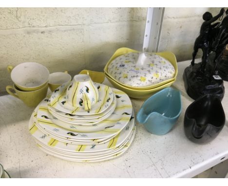 The residue of a Midwinter Stylecraft dinner service decorated in a squiggle and cross pattern together with other Midwinter 