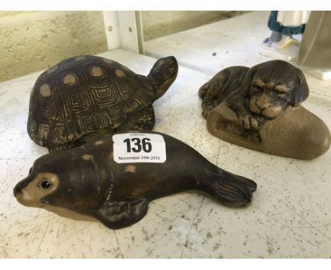 A Poole Pottery Barbara Linley Adams stoneware model of a Puppy on a Slipper together with a Tortoise and Seal.