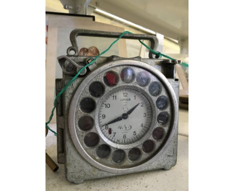 A Junior pigeon racing timing clock.