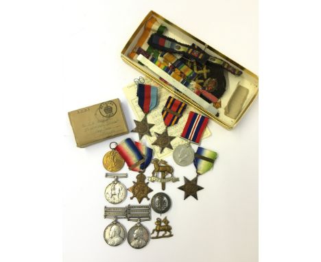 A Father and Son group of Boer War, WWI and WWII medals awarded to L-6025 Private G. C. Warwick RL. WT. Surrey Regiment and l