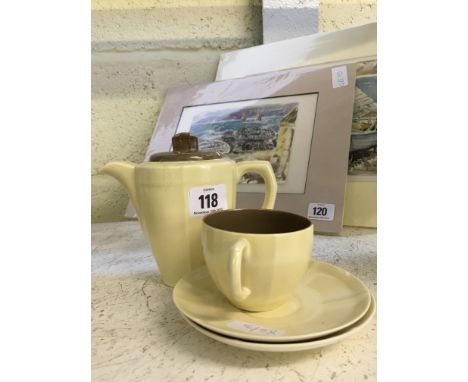 A small Poole Pottery Art Deco hot water pot, probably designed by Harold Stabler, shape 855, glaze C92 together with a match