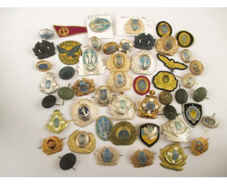 UKRAINE - INSIGNIA OF THE ARMY, NAVY & AIR FORCE 50 Badges of the Ukrainian military. Mostly cap insignia.