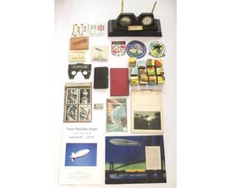 LOT OF ZEPPELIN COLLECTIBLES Including Graf Zeppelin Weltreise game, playing cards, stereoscopic viewer, Paris photo tile, bl