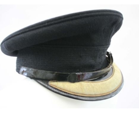 BRITISH ARMY FIELD OFFICERS SERVICE DRESS PEAK CAP  Black hat with black mohair band. Patent leather visor with gold bullion 