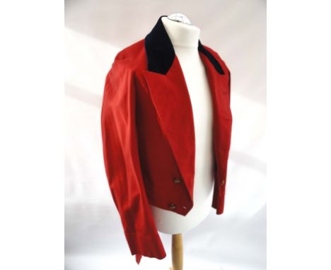 VICTORIAN SCARLET COATEE Red felt coatee with dark blue velvet collar. Queen Victoria crown buttons. Liner absent, light repa