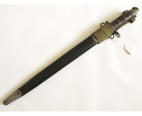 US 1917 MODEL REMINGTON BAYONET In it's leather and steel scabbard and canvas frog. VGC