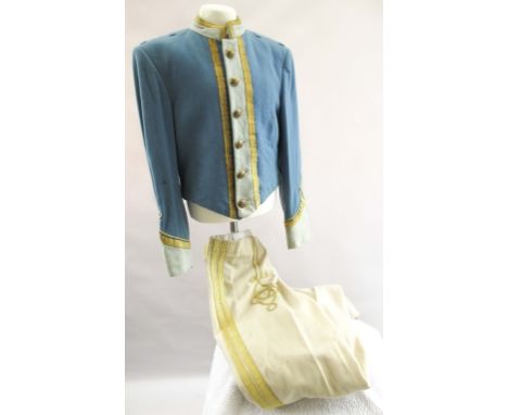 MARCHING BAND UNIFORM Light blue wool jacket with gilt wire bullion trim. Matching trousers in cream. Minor wear.