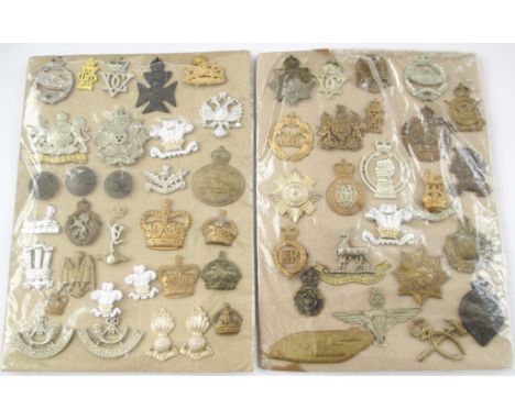 55 BRITISH ARMY BADGES A good mixed lot of cap and collar badges and sundry other items on two boards. (Contains restrikes)