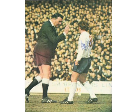 Alan Ball signed 11x8 inch colour magazine photo pictured while playing for England.  Good Condition. All autographs come wit