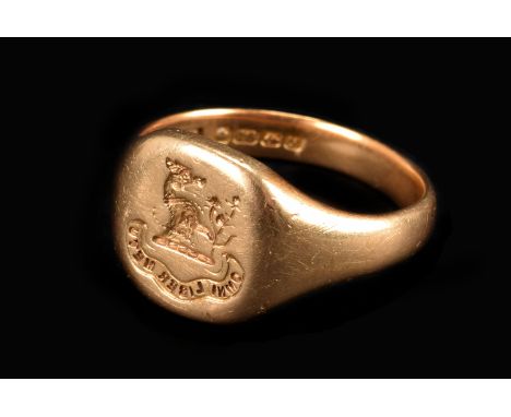 A vintage 18ct gold family crest signet ring, the intaglio tablet with motto of Omni Liber Metu below rampant wild boar, poss