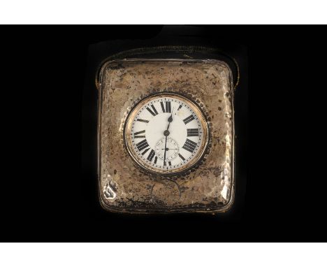 An Edwardian nickel cased Goliath pocket watch, the enamel dial with damage, keyless wound pin pallet movement, 6.5cm diamete