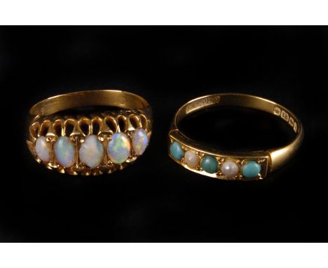 An 18ct gold and five stone opal ring, the oval polished stones in claw mounts, central stone chipped, together with an 18ct 