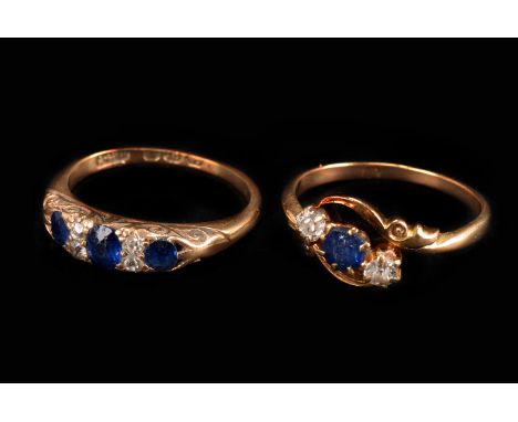 Two vintage 18ct gold sapphire and diamond rings, one being a three stone in crossover setting, the other set with three sapp