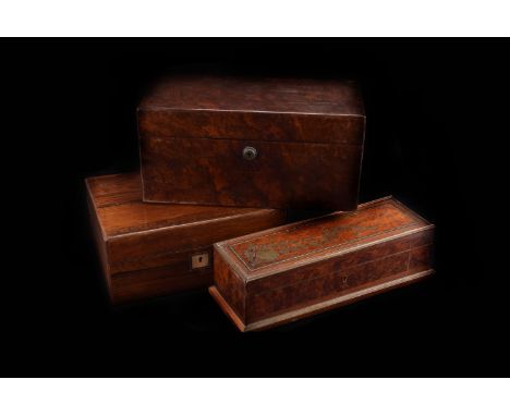 A 19th century walnut twin compartment tea caddy, marked S. Morden & Co. to the lock, together with three Victorian wooden bo