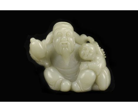 A 1920s celadon jade figure group, as a young child and an elder with a tea pot 7cm H