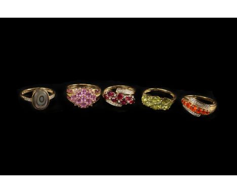 Five modern 9ct gold and gem set dress rings, including a pink stone cluster ring, a crossover style example with orange and 