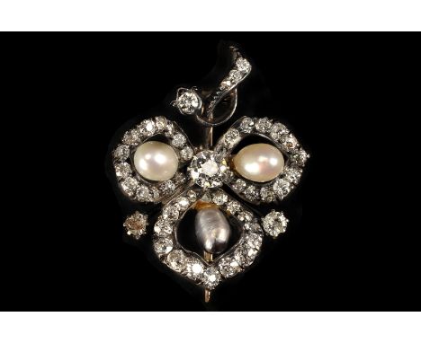 A pretty Edwardian period diamond and pearl brooch, the gold and silver mount in the form of a clover leaf, with a central ol