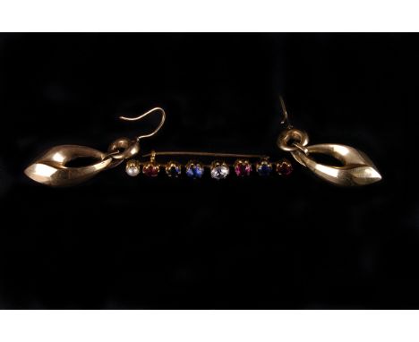 A pair of vintage yellow metal earrings, with faceted pierced drops, together with a paste set bar brooch (3)