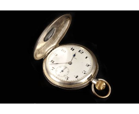 A George V silver half-hunter pocket watch, the four piece silver case import marked London 1919, the white enamel dial signe