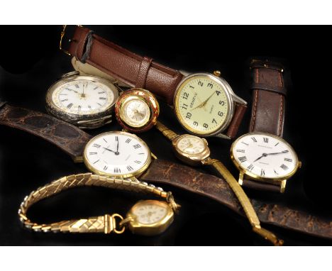 A group of seven vintage and modern watches, including a continental silver ladies pocket, a 9ct gold cased lady’s watch, two