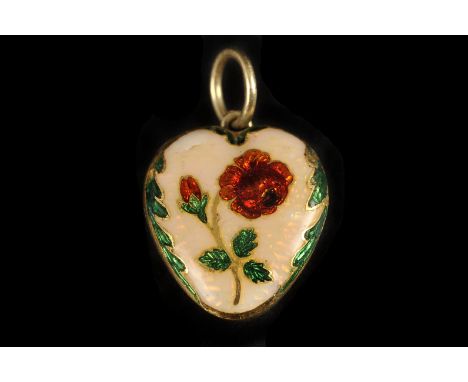 An antique gold and enamel pendant, the heart shaped form with enamel to front of a rose, with glazed panel to reverse, loose