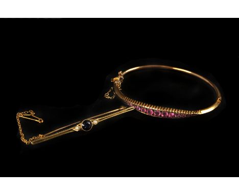 A vintage 15ct gold sapphire and seed pearl bar brooch or tiepin, presented in a fitted box, together with a pretty 9ct gold 