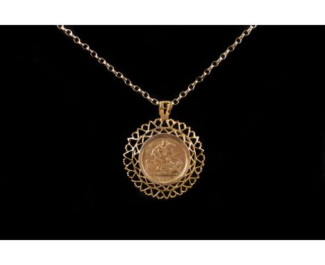 A 9ct gold mounted Edward VII half sovereign, the 1905 dated gold coin pierced pendant surround, on a 9ct gold chain necklace