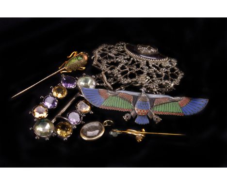 A vintage Egyptian champlevé brooch, in the form of a bird with spread wings, together with a scarab beetle brooch, a 19th ce