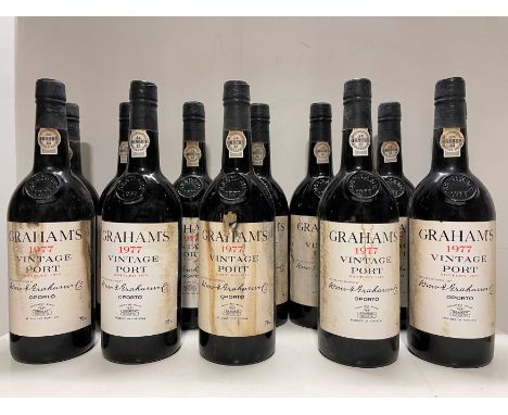 Graham's Vintage Port 1977, 12 bottles, stained labels, most levels base of neck, others near very top shoulder, in a cellar-