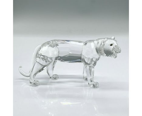 Clear faceted crystal figure of a powerful standing tiger mid roar. Swarovski mark. This item has its original box: 7.25"L x 