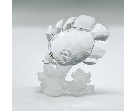Clear faceted crystal figure of a fish with blue eyes swimming downwards, frosted base. Swarovski mark. This item has its ori
