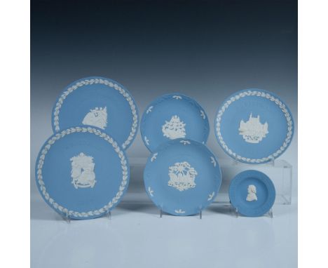 The plates feature a pale blue ground adorned with white raised relief figures and border. Additionally, there is a small Wed
