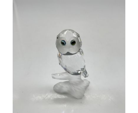 Part of the Up In The Trees theme group this cute faceted figural looks out with his alert aqua crystal eyes on his high fros