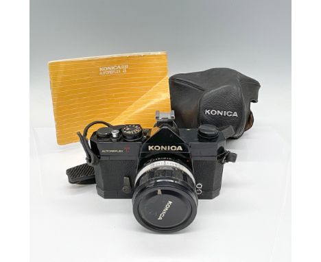 This all-black camera is part of the Autoreflex series, made in Japan with serial #822594. Strap, lens, lens cover, case and 