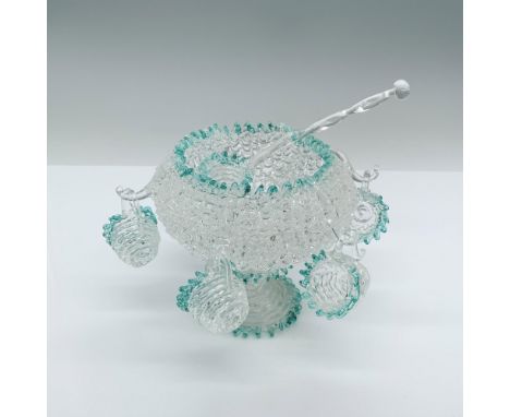 A decorative spun glass punch bowl that measures 5.5"dia. x 4.5"H, not including the six hooks around the perimeter to hang t