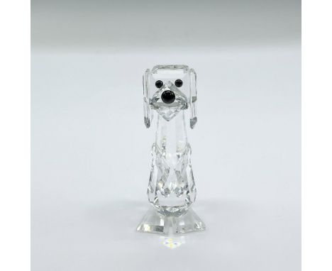 Clear faceted crystal figure of a dog with black eyes and nose. Swarovski mark. This item has its original box: 4.75"H x 3.25