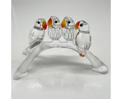 Part of the Feathered Beauties theme group, this cheerful bunch is created from clear crystal and are accented by their color