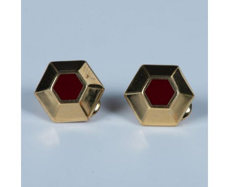 Gold tone hexagonal clip-on earrings with red centers. Monet hallmark stamped on the back clips. Dimensions: 0.75"L x 0.75"WM